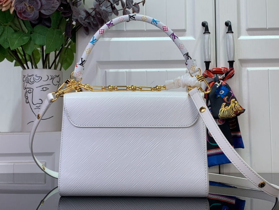 루이비통 LV X TM 트위스트 슬림 백 미디엄 M13243 16823cm 화이트2.jpg