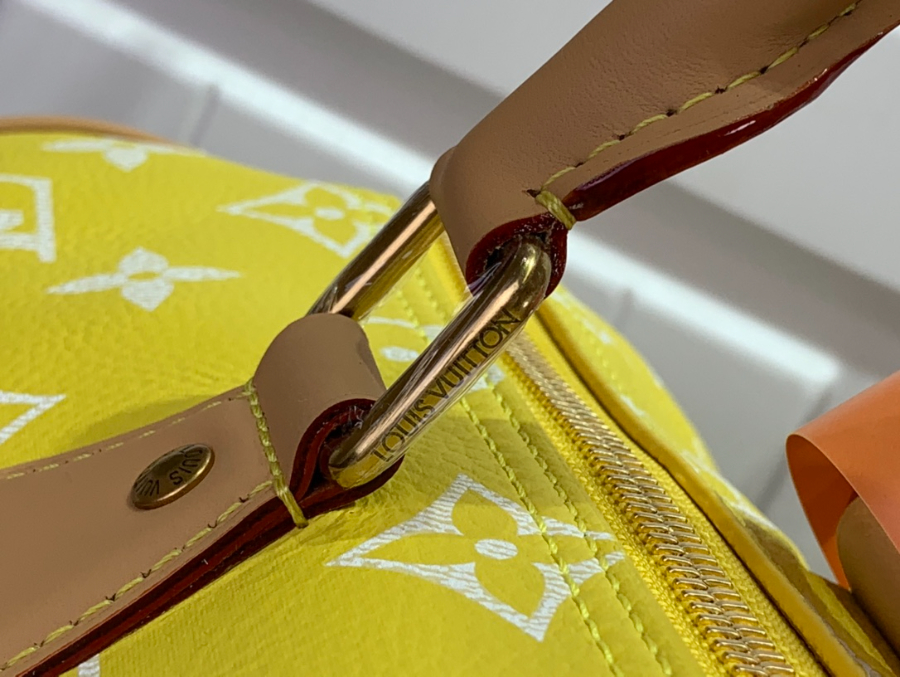 루이비통 스피디 P9 반둘리에 40 모노그램 옐로우 402623cm M244198.jpg